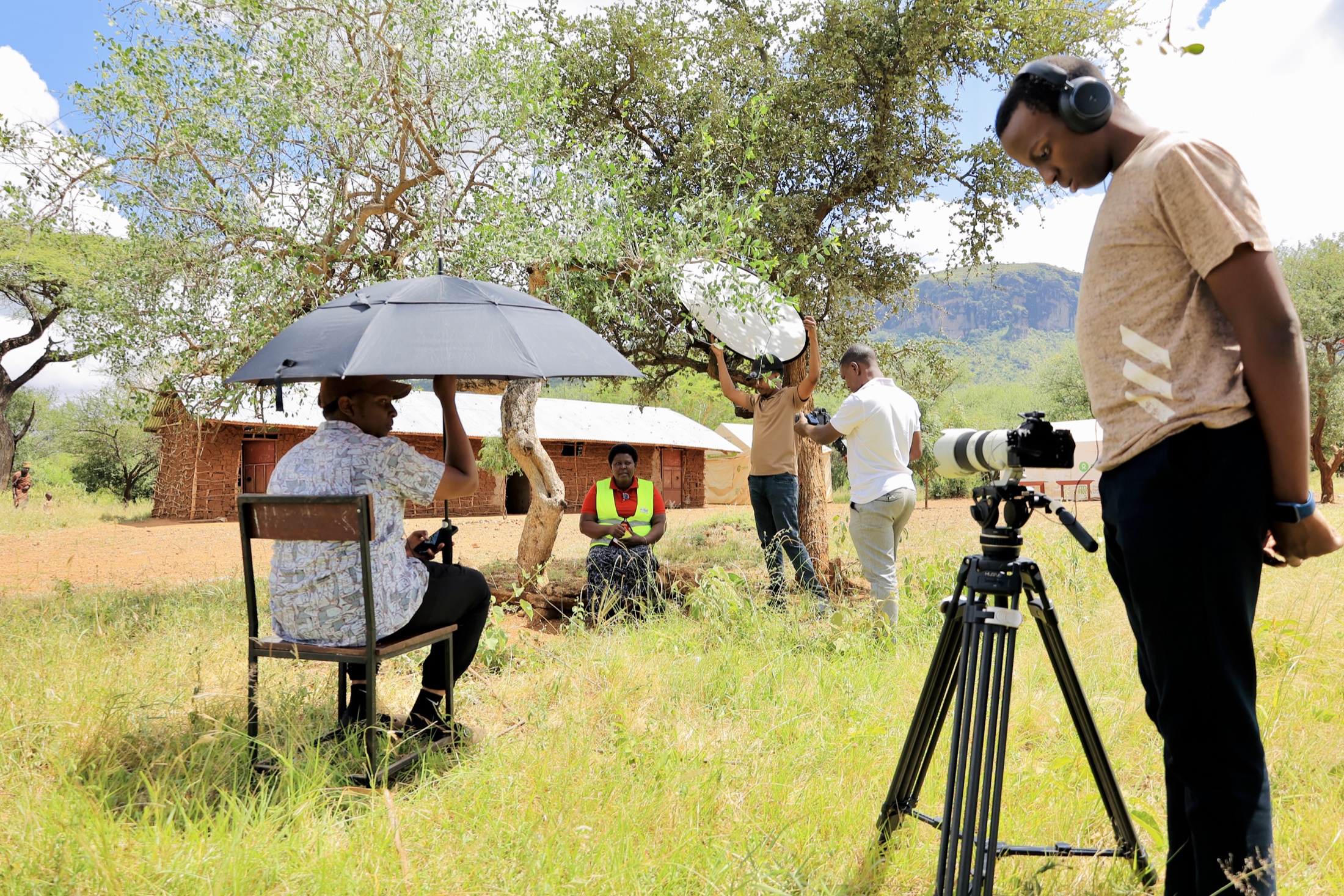 Documentary interview set up beneath a tree in Napedo