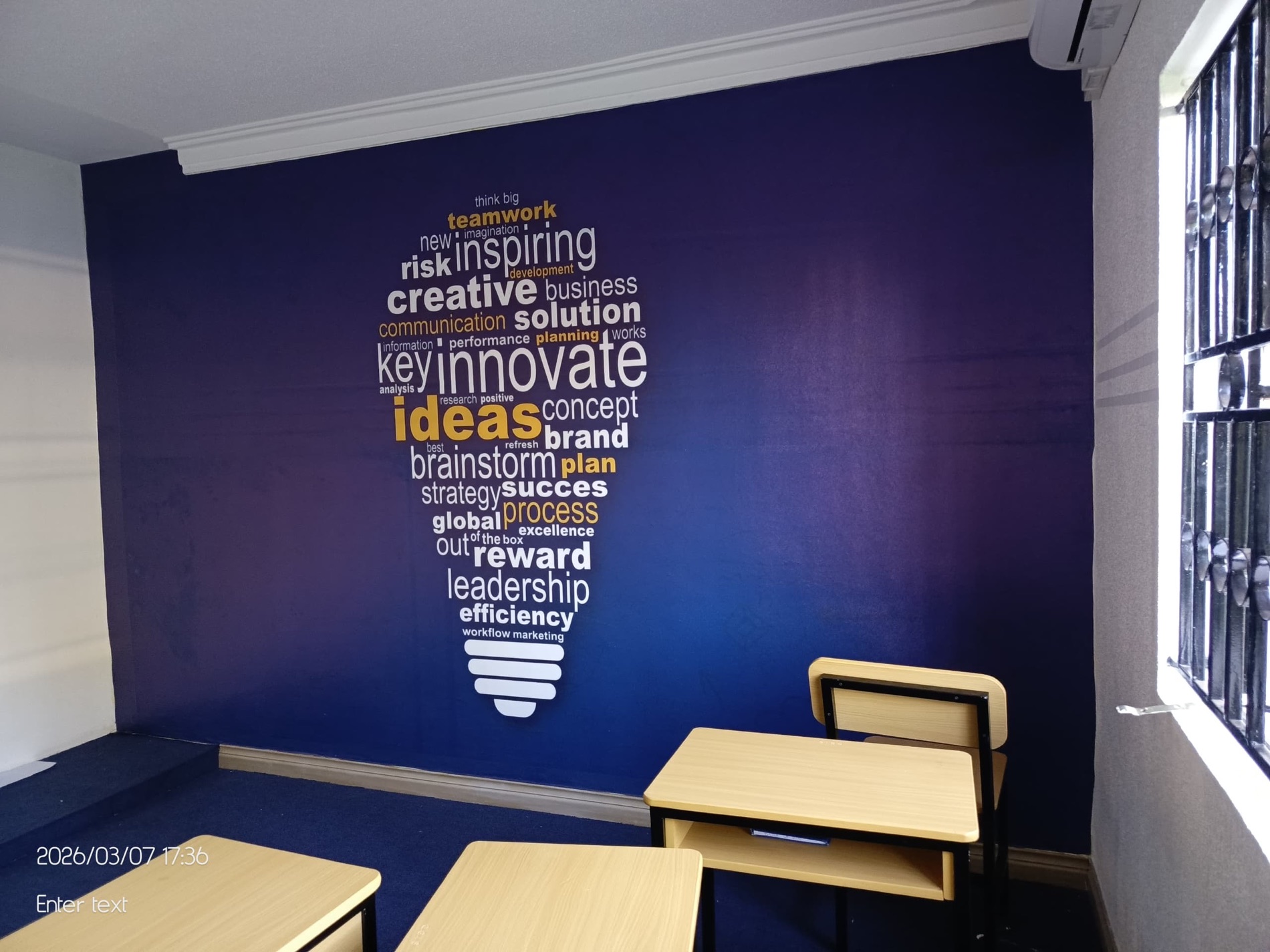 Branded classroom wall created for Queensgate International School